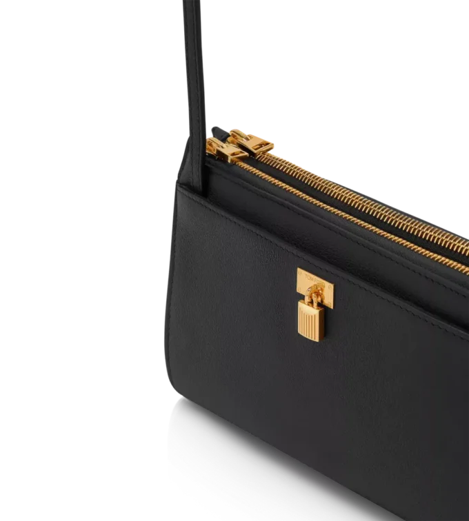 Mini-Tasche aus naturbelassenem Leder mit Vorhängeschloss und Riemen